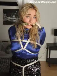 Photo of Zoey Ziptie in bondage.