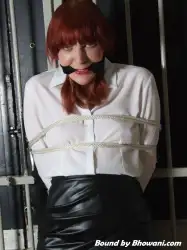 Photo of Kitty Quinzell in bondage.