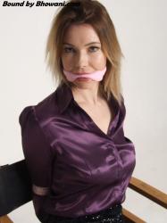 Photo of Nicky Phillips in bondage.