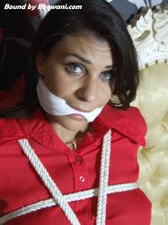 Photo of Roxy Mendez in bondage.