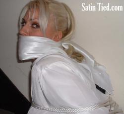 Photo of Satin Bonus in bondage.